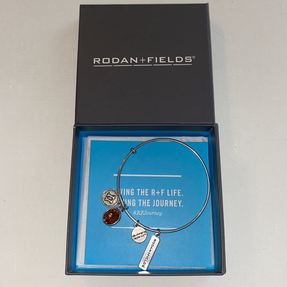 Rodan + and Fields Level II Dangle Bracelet